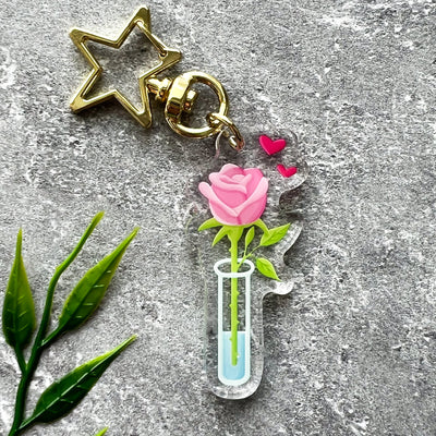 Pink rose acrylic keychain. Double-sided, backside is the same design, but reversed.