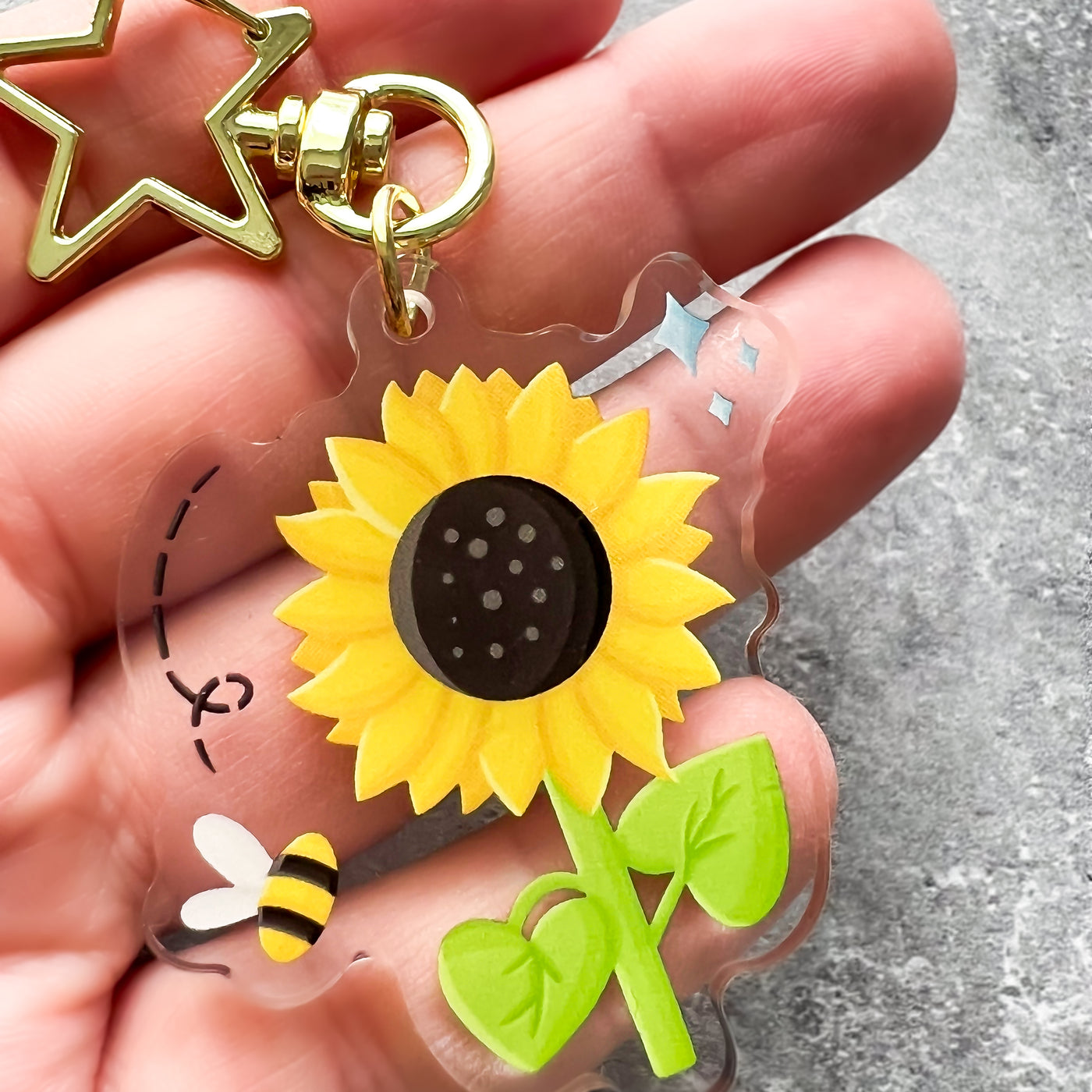 Sunflower acrylic keychain. Double-sided, backside is the same design, but reversed.