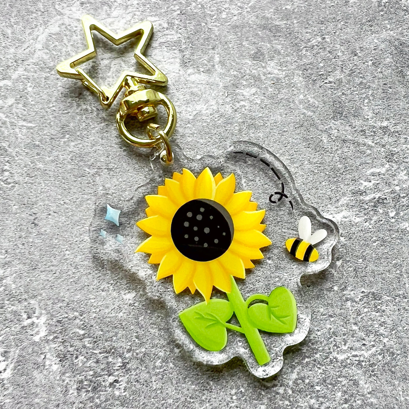 Sunflower acrylic keychain. Double-sided, backside is the same design, but reversed.