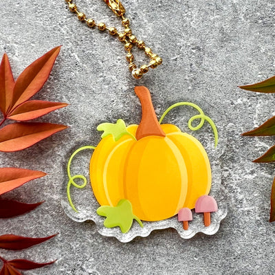 Pumpkin acrylic keychain. Double-sided, backside is the same design, but reversed.