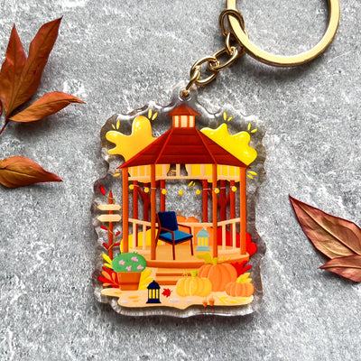 Autumn gazebo transparent acrylic keychain. Double-sided, backside is the same design, but reversed.