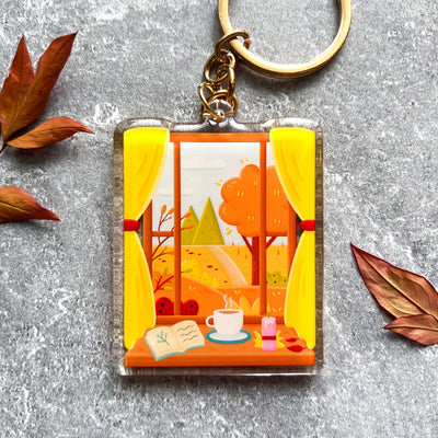 Autumn window view transparent acrylic keychain. Double-sided, backside is the same design, but reversed.