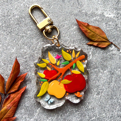 Autumn apple branch transparent acrylic keychain. Double-sided, backside is the same design, but reversed.