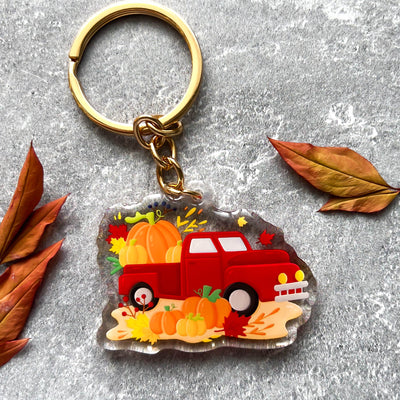 Autumn farm truck transparent acrylic keychain. Double-sided, backside is the same design, but reversed.