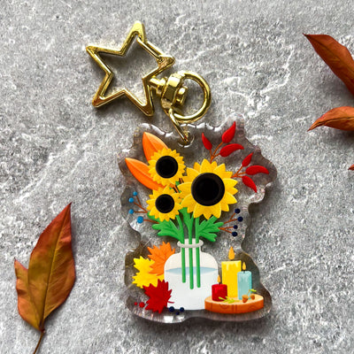 Autumn sunflowers in a vase transparent acrylic keychain. Double-sided, backside is the same design, but reversed.