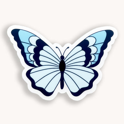 Clear blue butterfly vinyl sticker by Simpliday Paper by Olga Nagorna comes with a solid white backing, but is clear once the backing is removed.